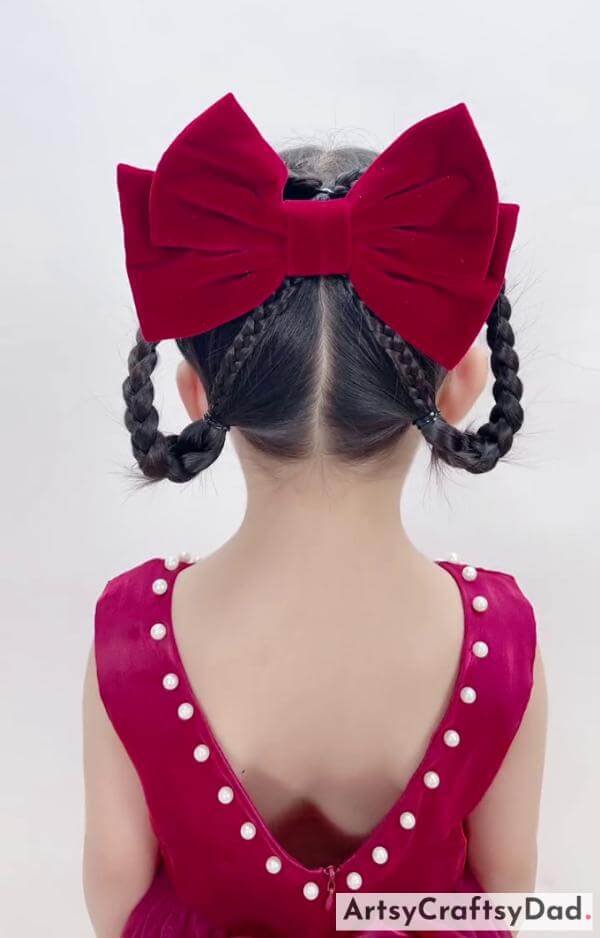 A Round Braided Dual Ponytail Hairstyle For Kids-Cute Red Ribbon Braids Hairdo for Young Girls