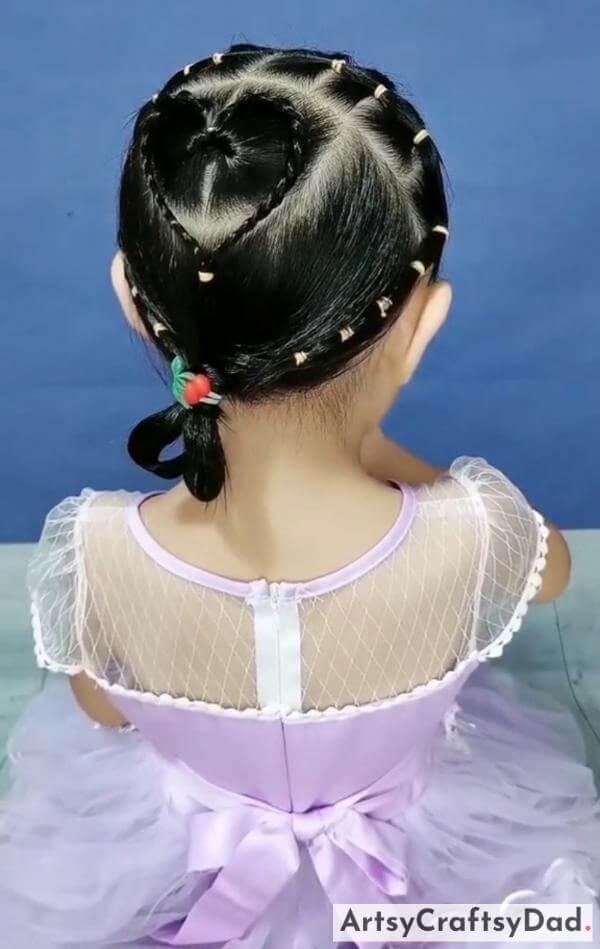 A Side Braided Hairstyle For Kids-Pretty braided hairstyle designed for young ones