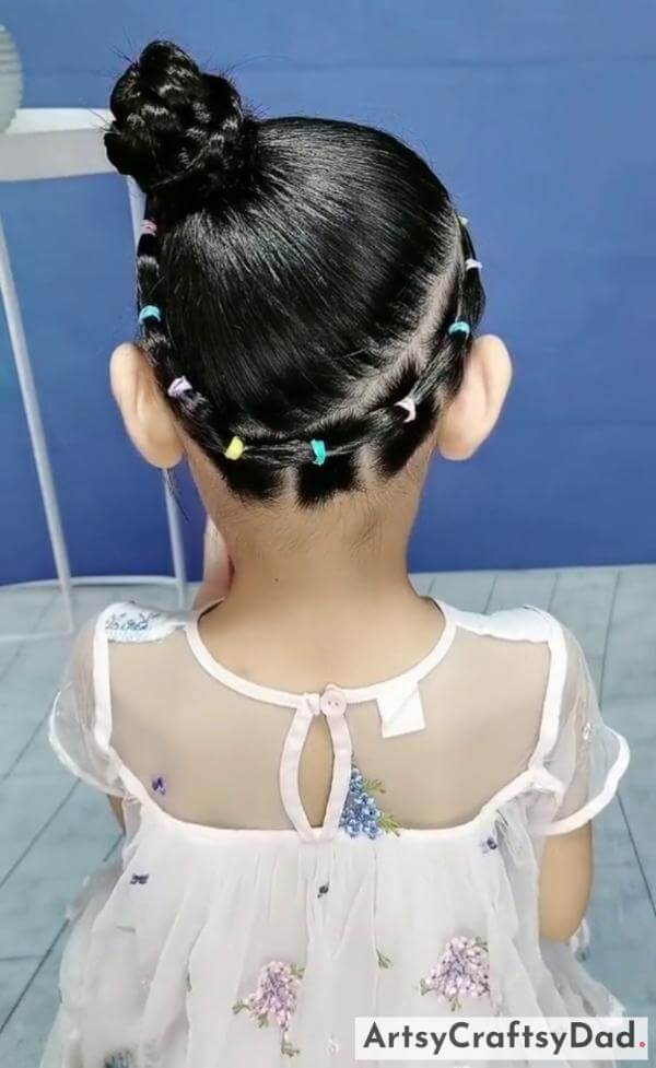 Creative Round Braided Bun Hairstyle for Kids-Darling hairclips styled with a braided bun hairstyle for children.