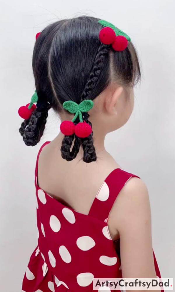 Lovely Dual Braided Hairstyle -Attractive hairstyle with red ribbon braids for children