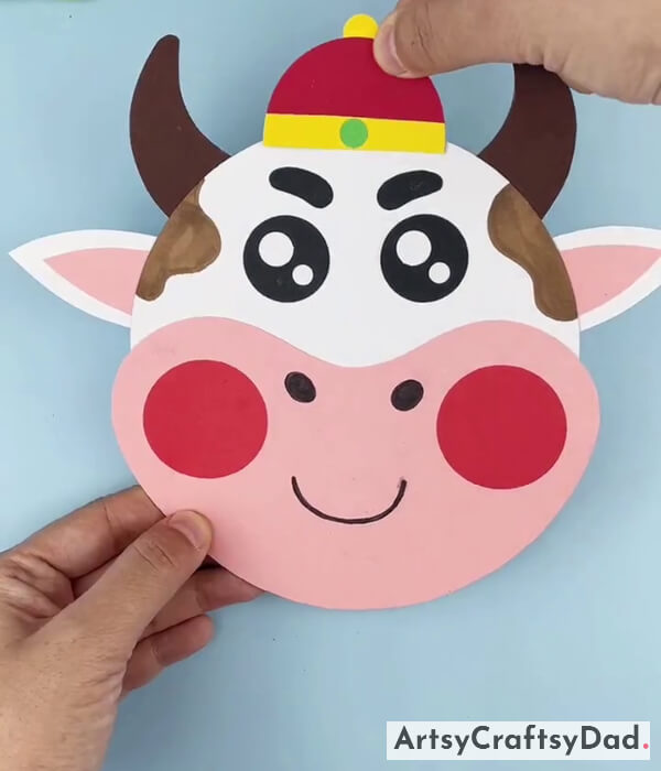 Add The Bell On The Head Of The Cow