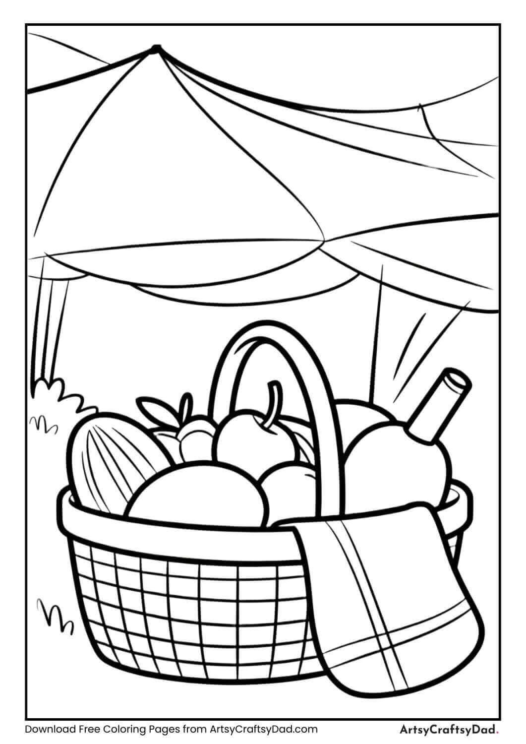 Summer picnic with basket, fruits, and blanket.